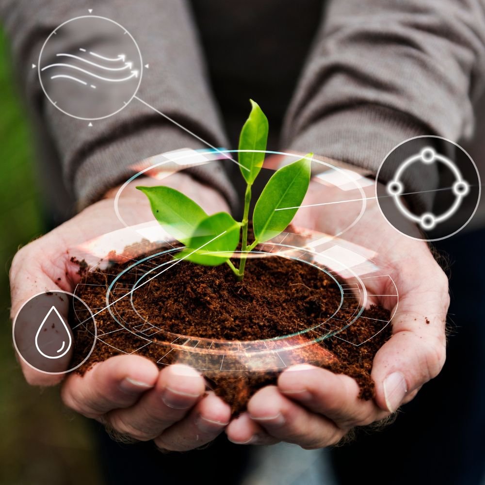 Hands holding a plant in soil with digital holographic icons representing water, air quality, and data connectivity, symbolizing smart agriculture maxxgro agrology limited.